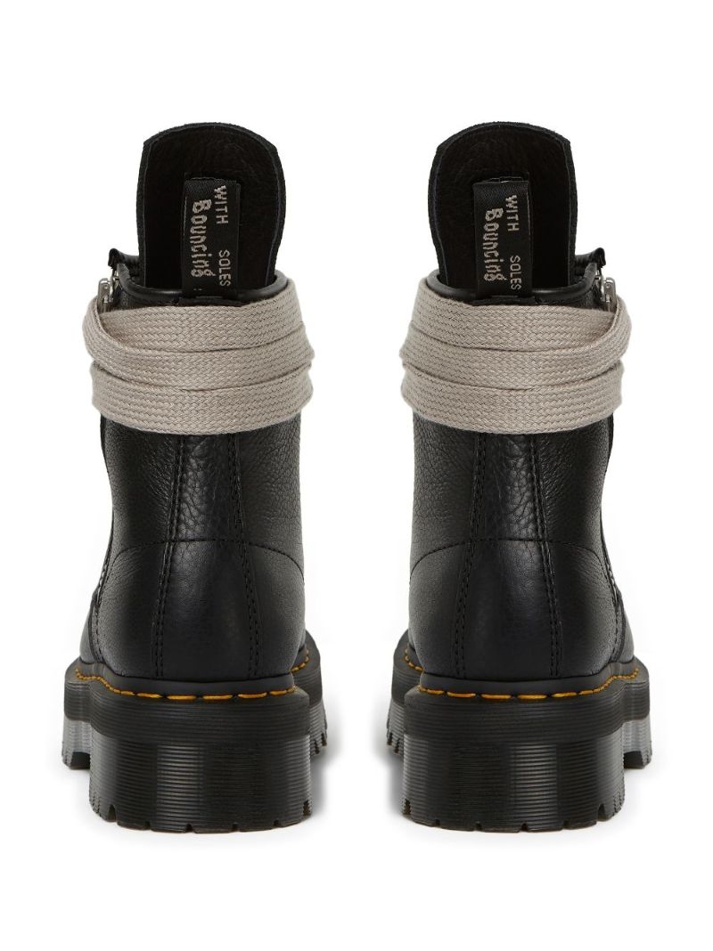 Black X Dr. Martens Leather Ankle Boots