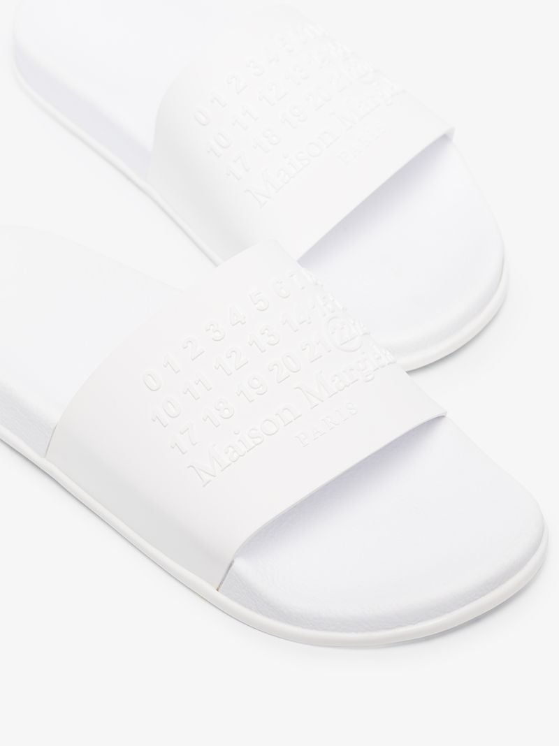 White Embossed Logo Slides
