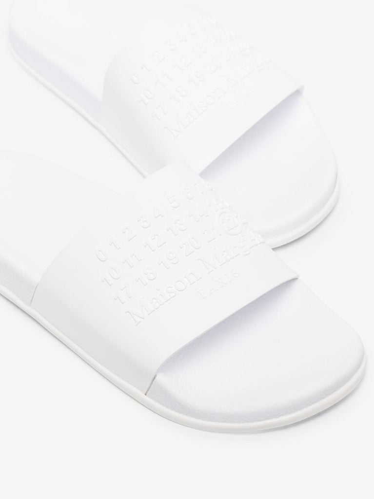White Embossed Logo Slides