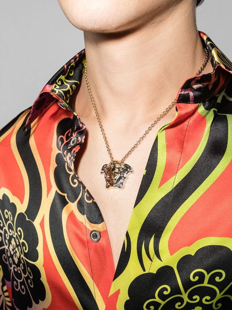 Gold Tone Spliced Medusa Pendant Necklace