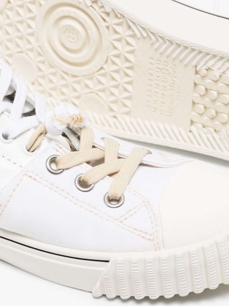 White Evolution Low Top Sneakers