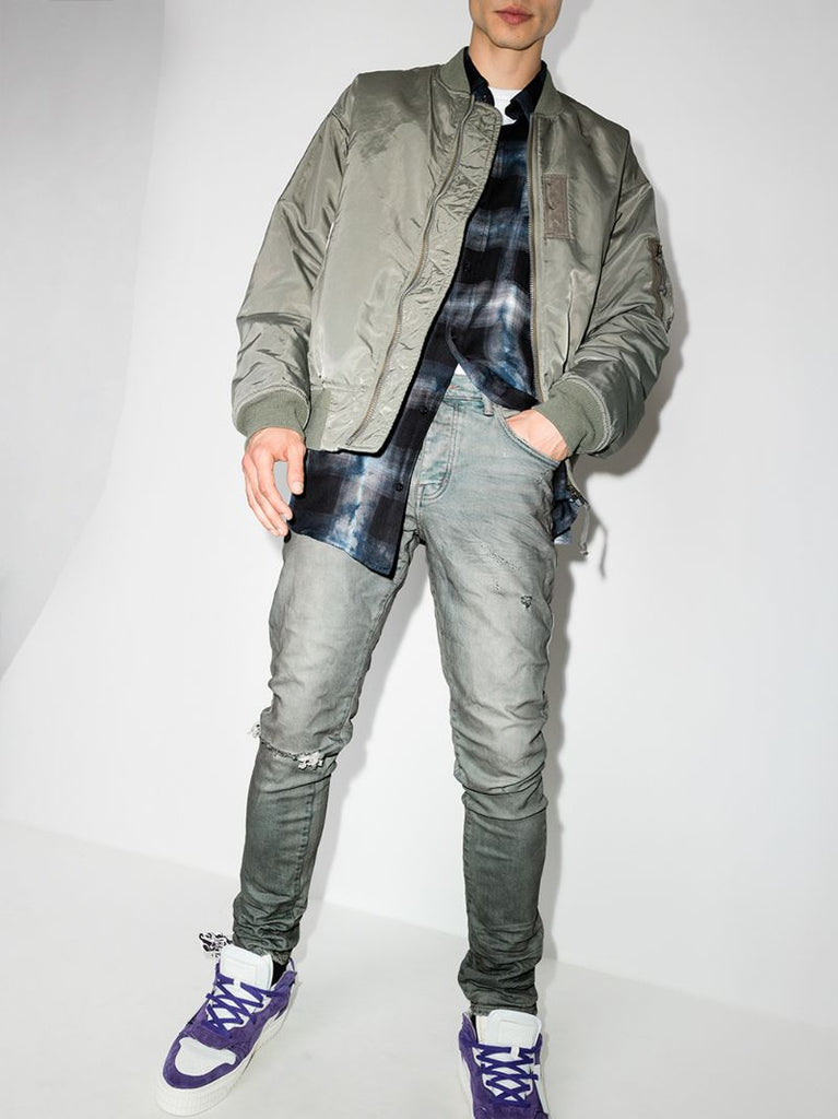 Distressed Slim Leg Jeans