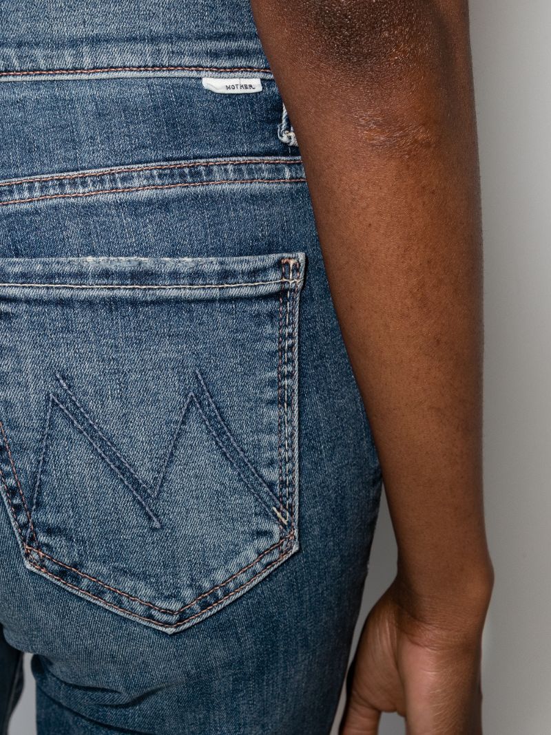 The Weekender Frayed Flared Jeans