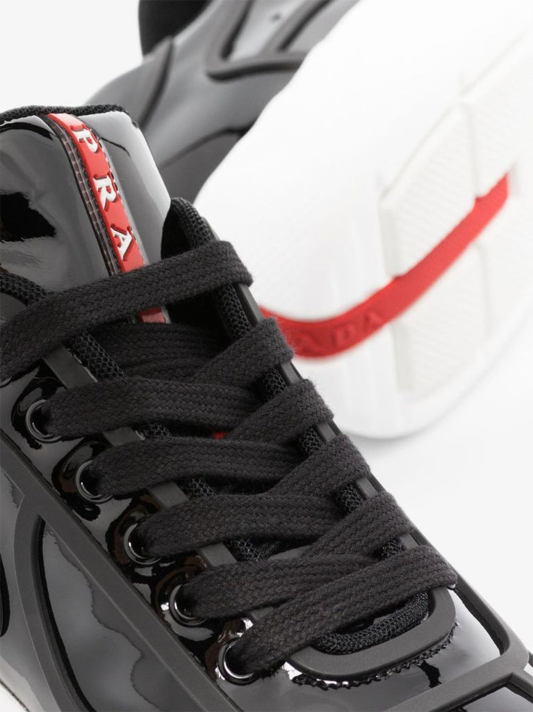Black AmericaÃ¢â_x0082_¬â_x0084_¢s Cup Patent Leather Sneakers