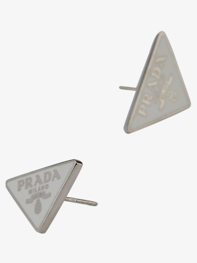 Silver Tone and White Symbole Stud Earrings