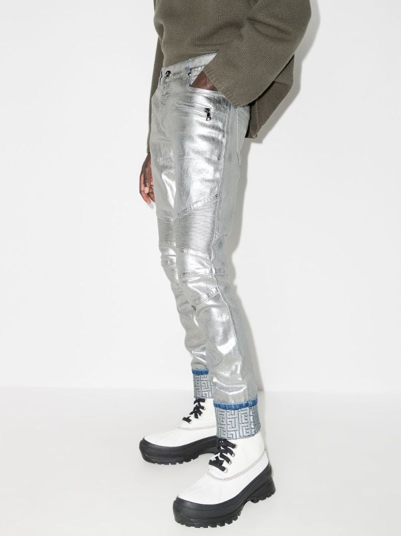 Logo Embossed Slim Leg Jeans