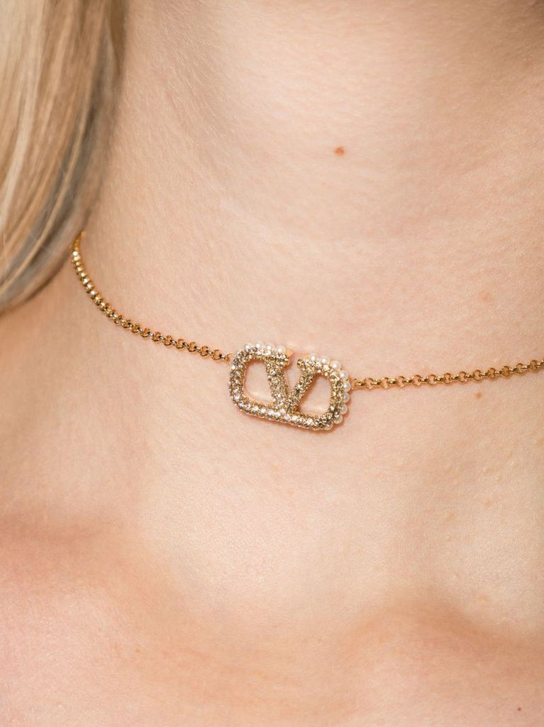 Gold Tone Vlogo Crystal Necklace