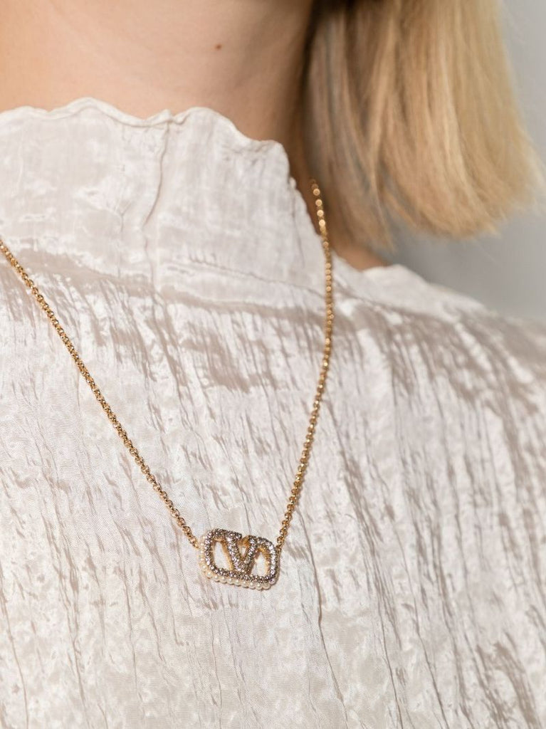 Gold Tone Vlogo Crystal Necklace