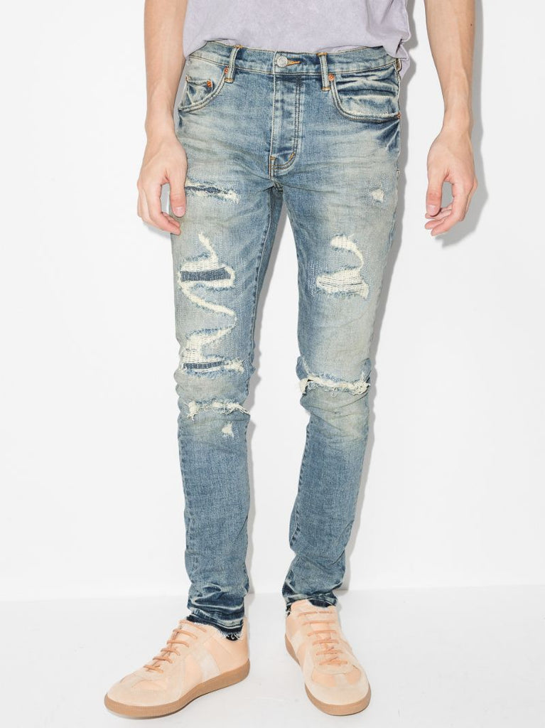 P001 Vintage Distressed Skinny Jeans