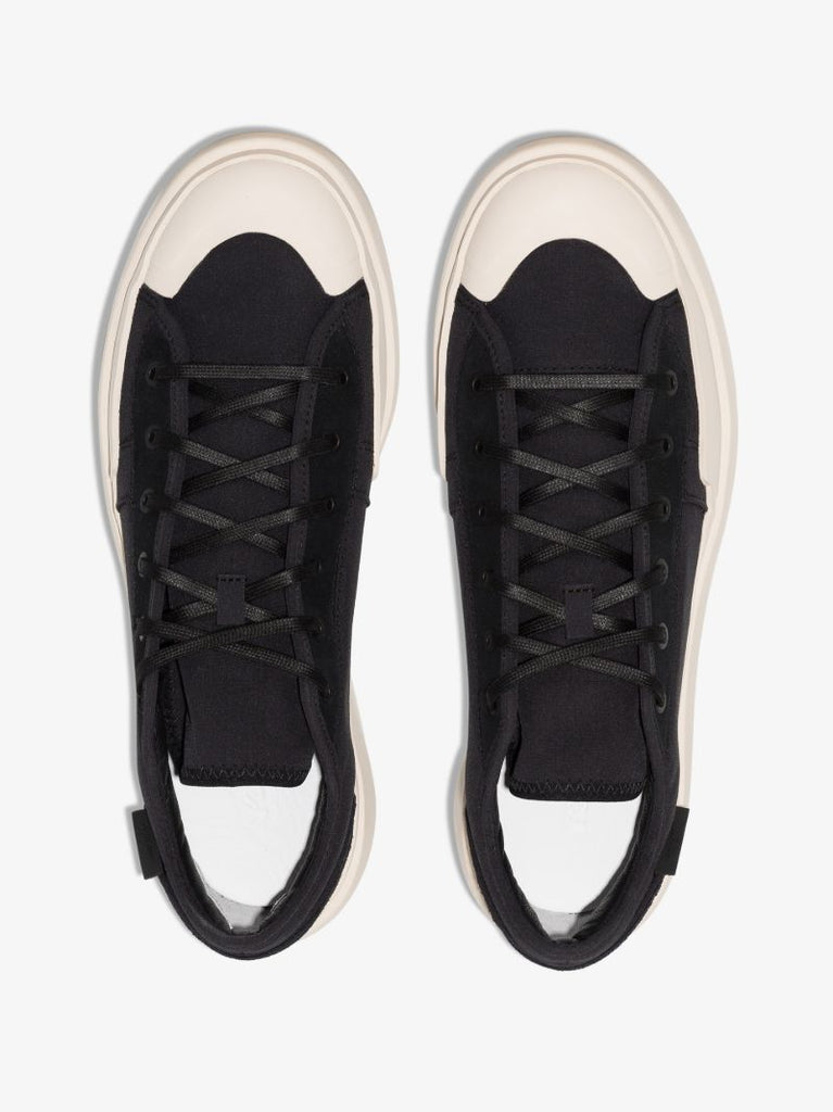 Black Ajatu Court Low Top Sneakers