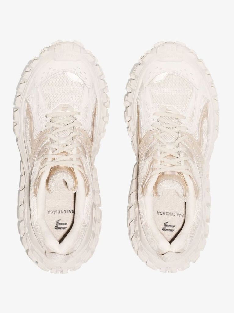 White Defender Low Top Sneakers
