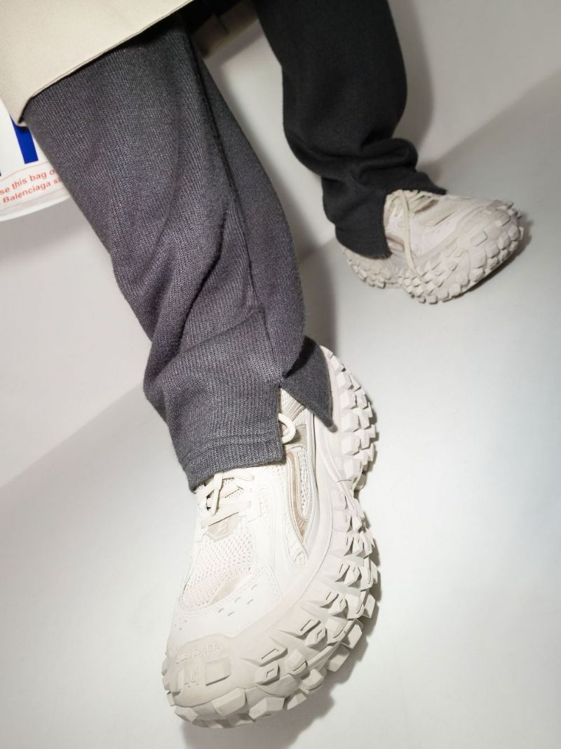 White Defender Low Top Sneakers