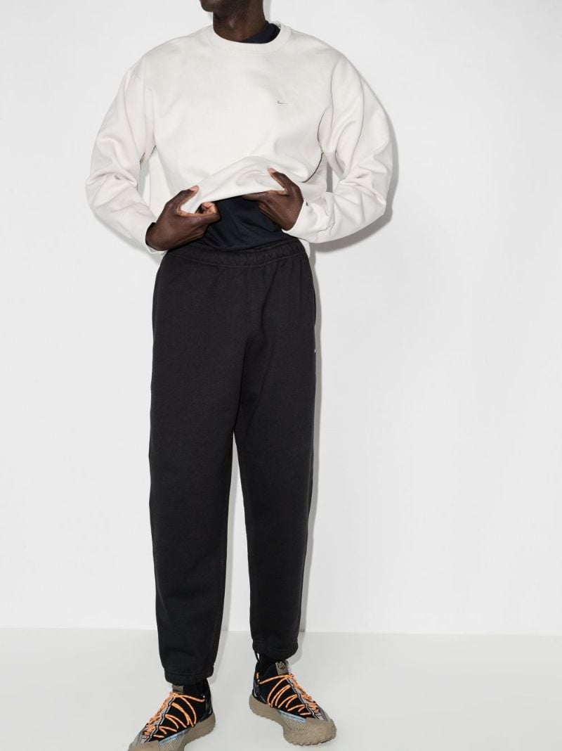 Swoosh Logo Track Pants