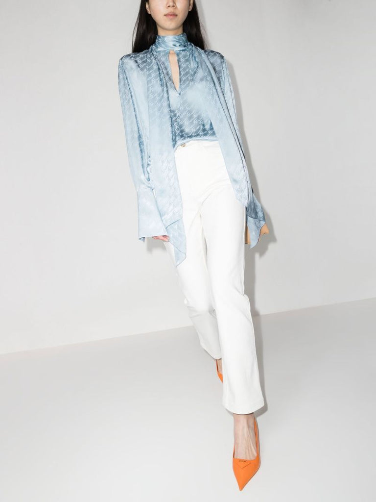 Logo Embossed Slim Leg Jeans