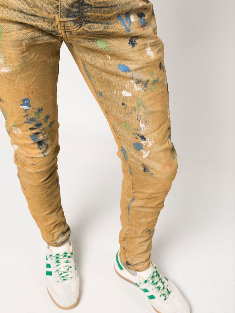 Neutral P001 Distressed Low-rise Slim-leg Jeans