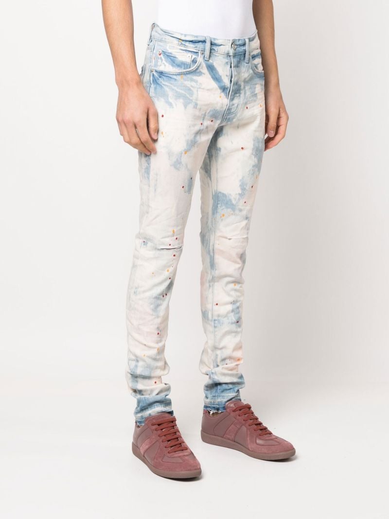 Blue Bleached Splatter Skinny Jeans