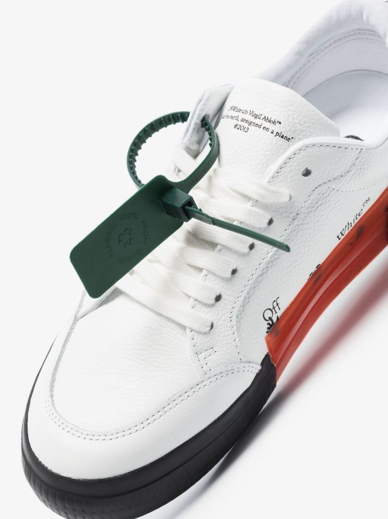 White Vulcanised Low Top Sneakers