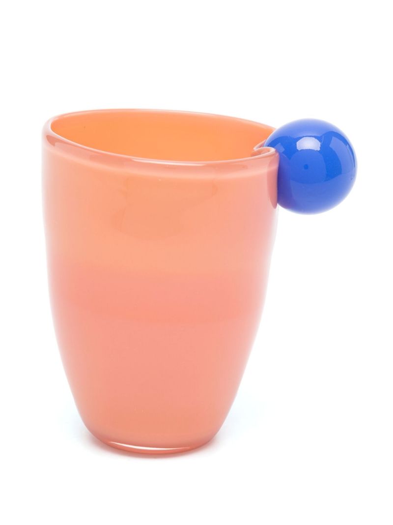 Orange Bon Bon Water with a Twist Glass