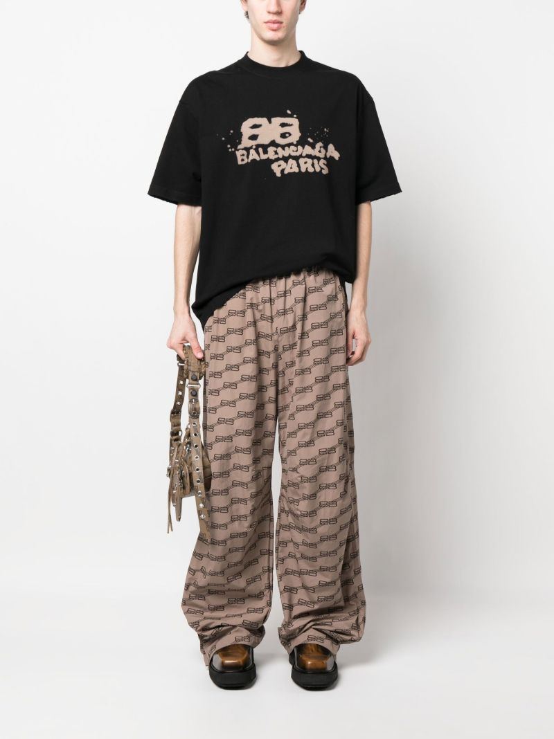Neutral Monogram Print Track Pants