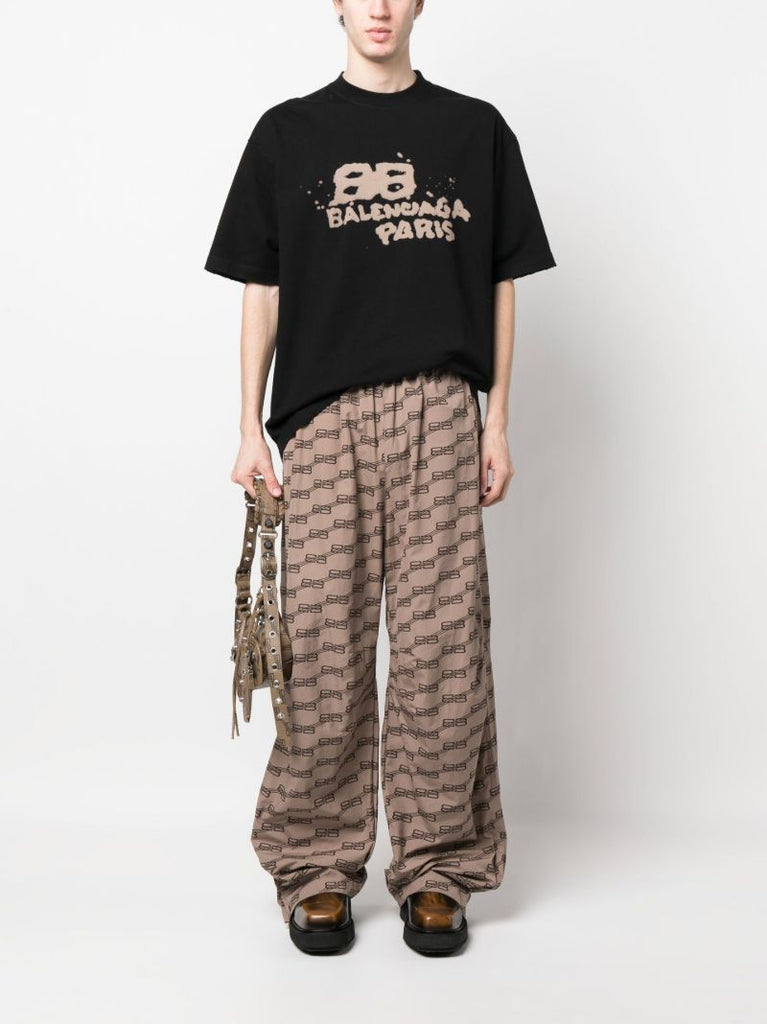 Neutral Monogram Print Track Pants