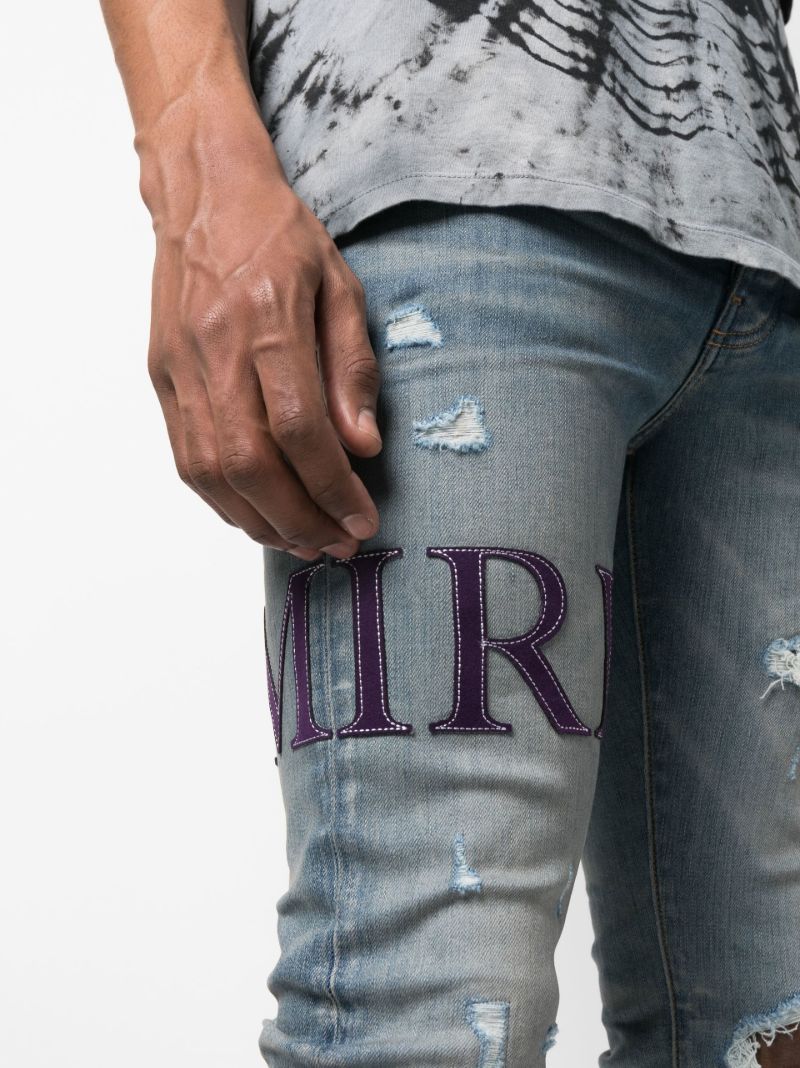 Blue Serif Logo Distressed Skinny Jeans