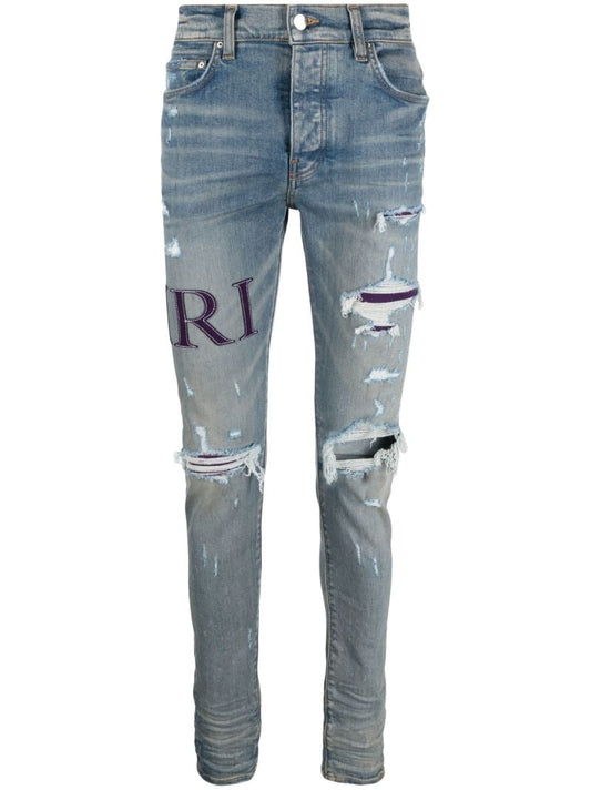 Blue Serif Logo Distressed Skinny Jeans