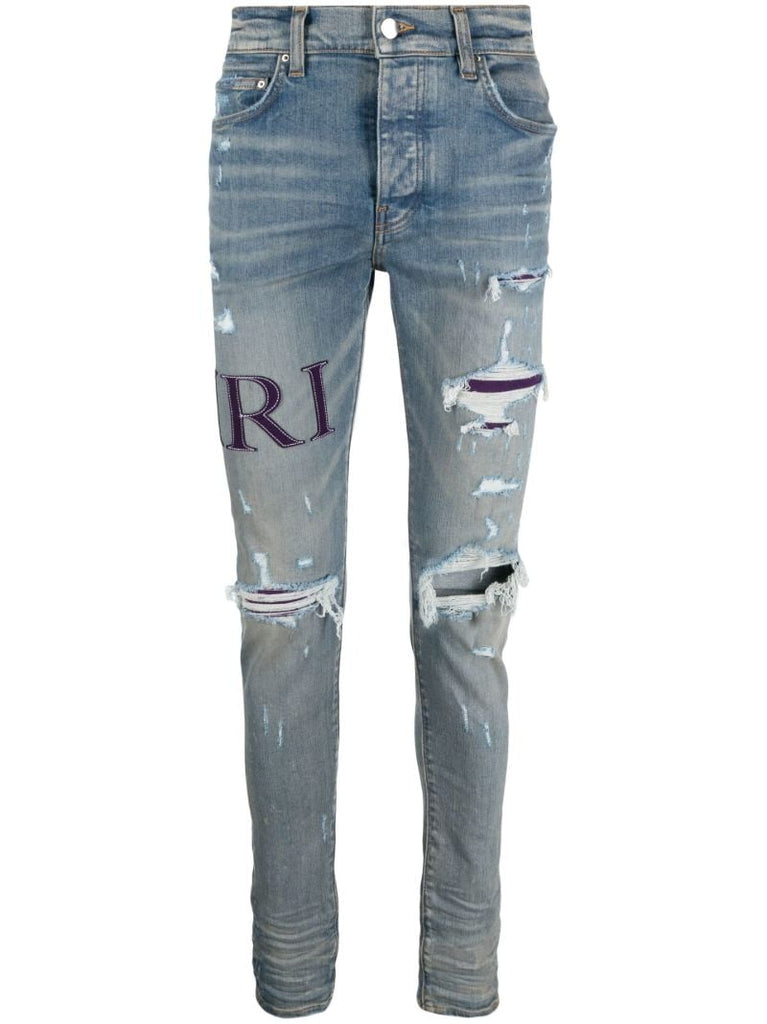 Blue Serif Logo Distressed Skinny Jeans