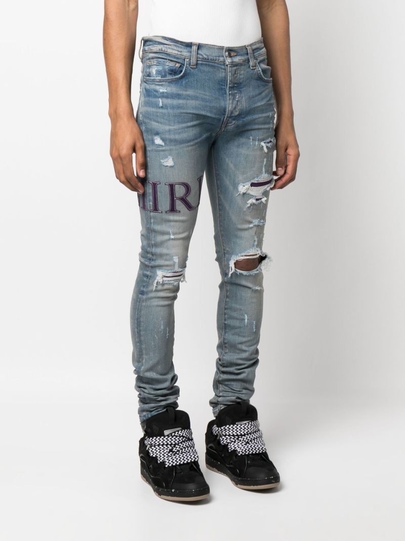 Blue Serif Logo Distressed Skinny Jeans