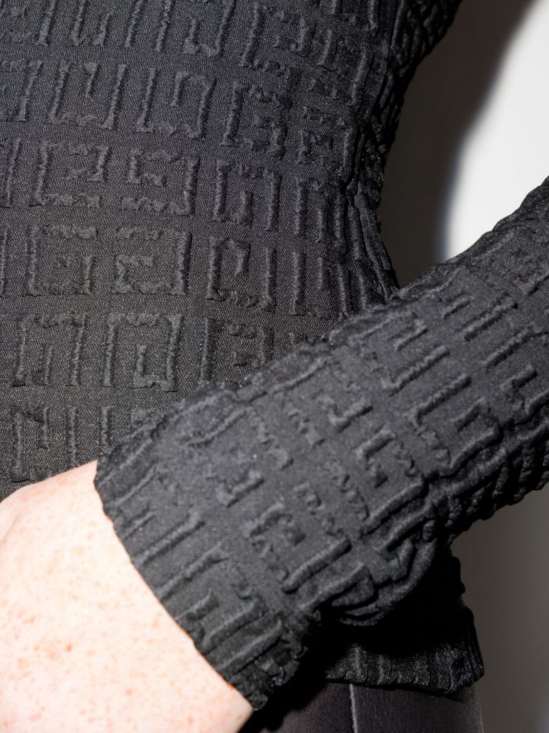 Black 4g Embroidered Turtleneck Top