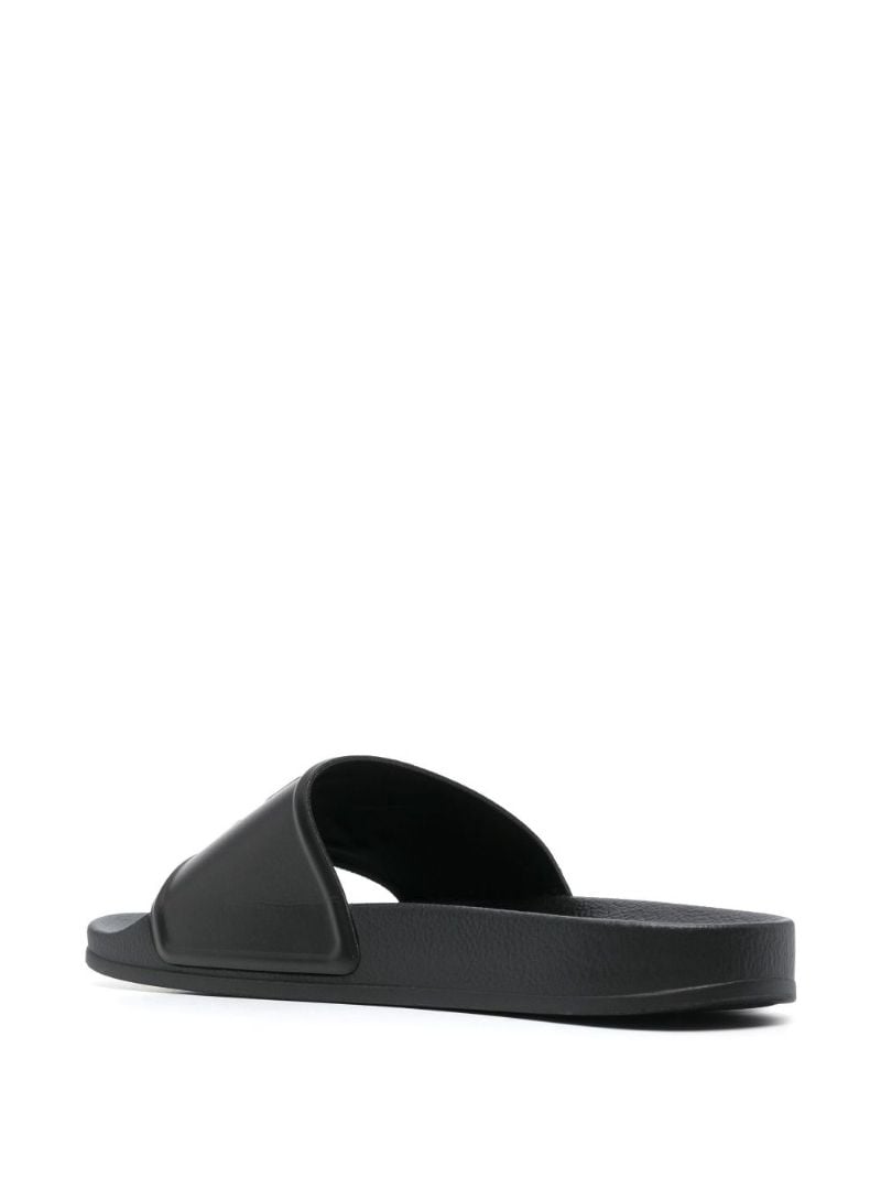 Black Arrows Print Rubber Slides