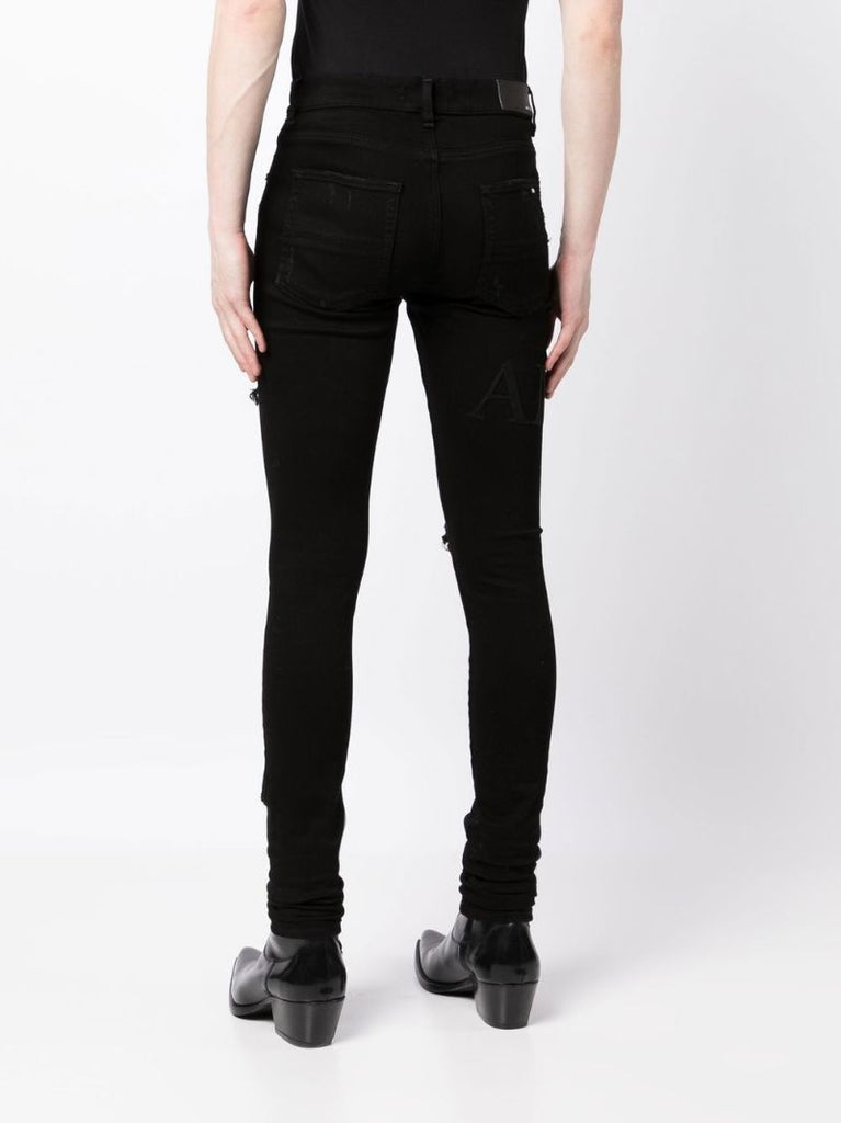 Black Serif Logo Distressed Skinny Jeans