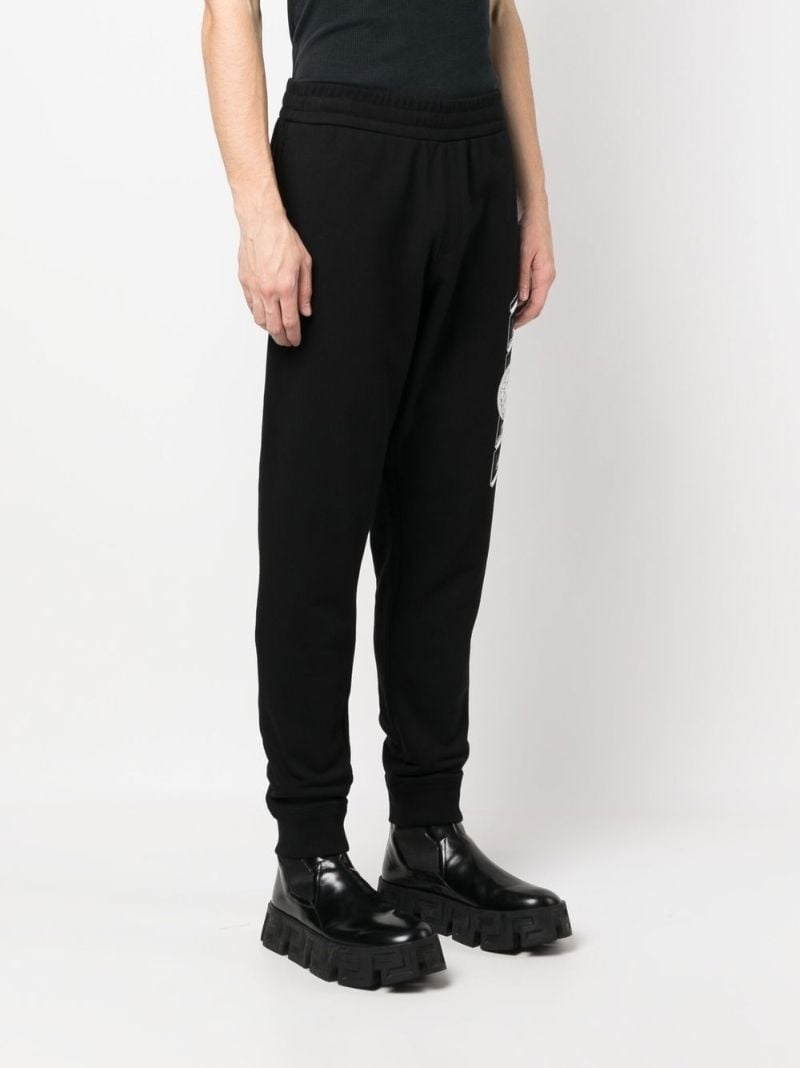 Black Medusa Print Tapered Track Pants