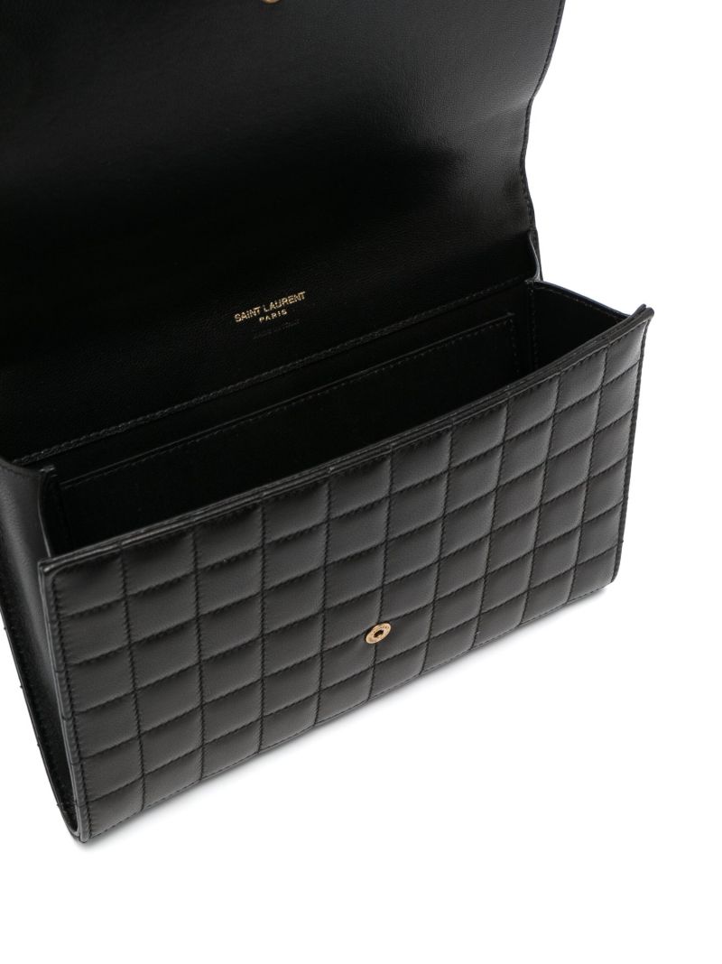 Black Cassandre Quilted Leather Clutch Bag