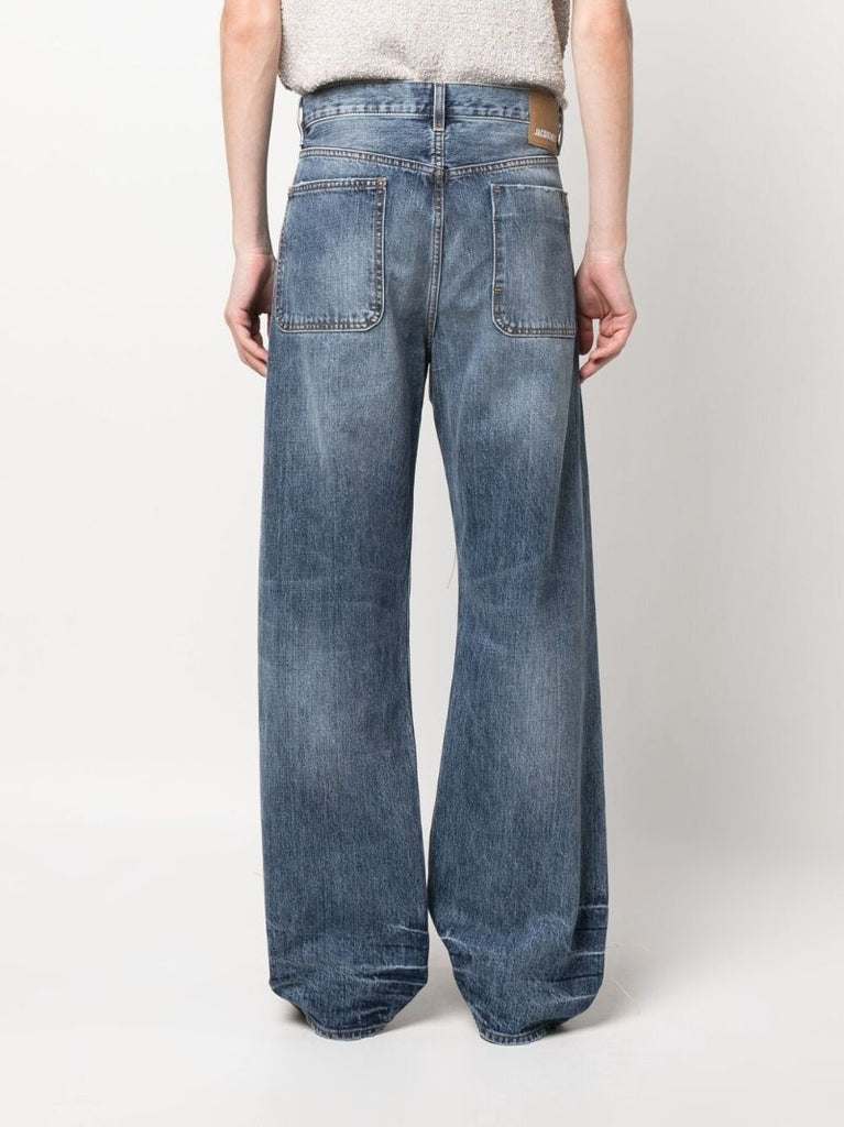 Blue Distressed Bootcut Jeans