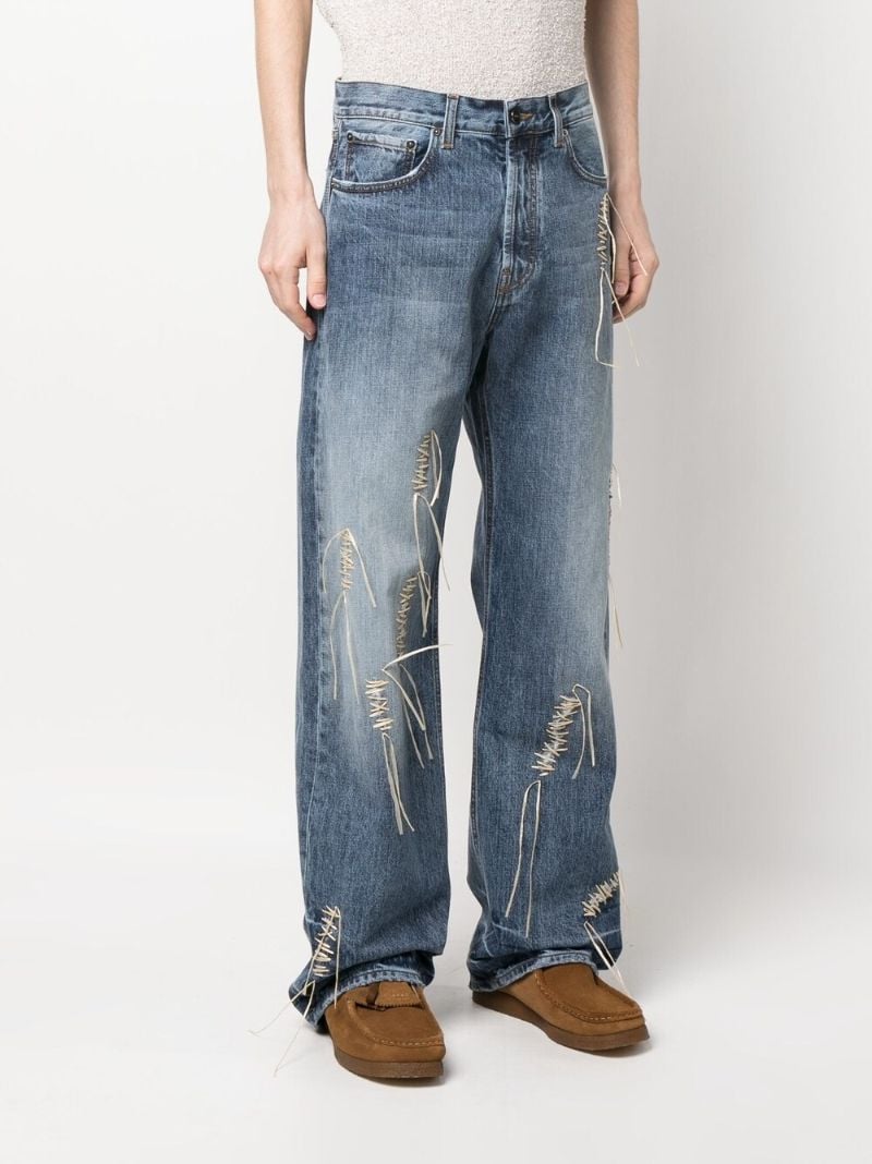 Blue Distressed Bootcut Jeans