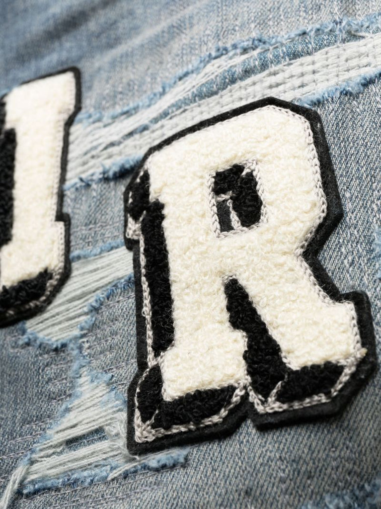 Blue Amiri Varsity Skinny Jeans