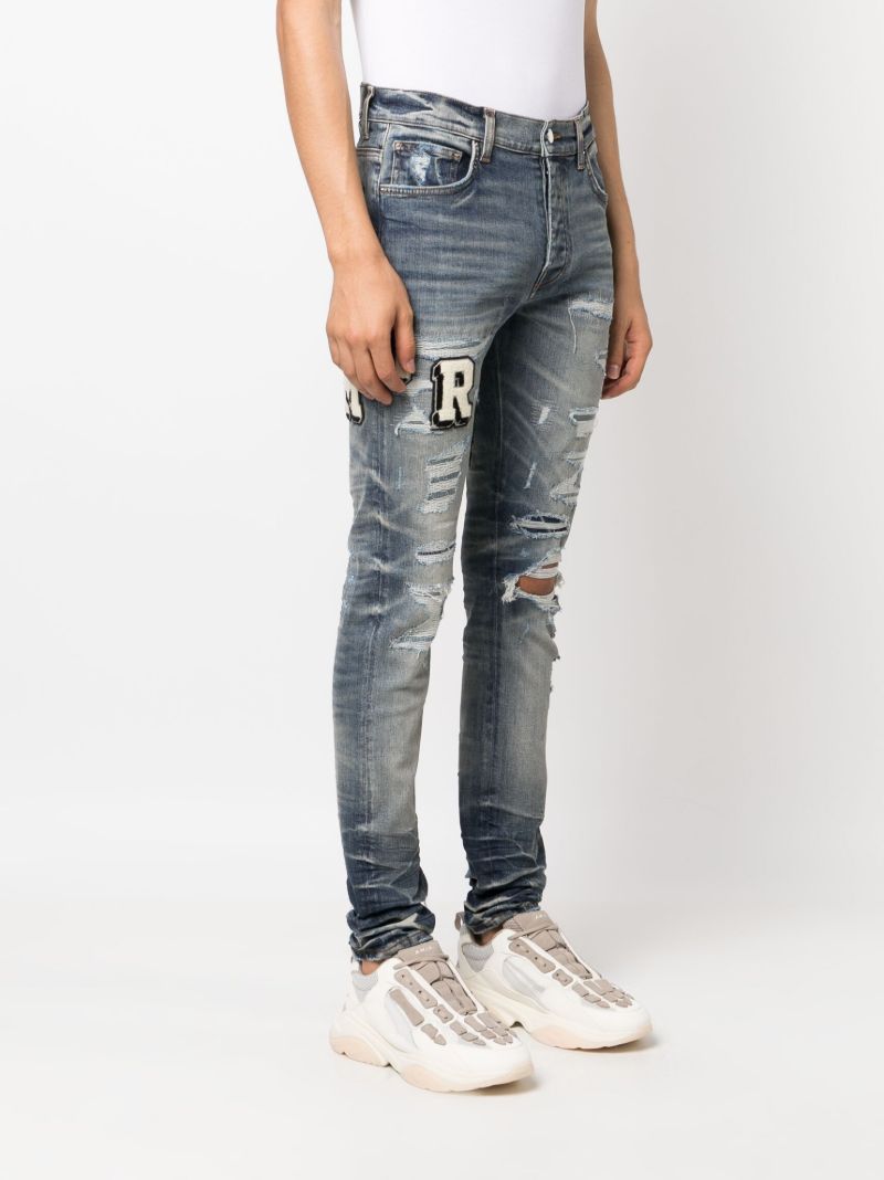 Blue Amiri Varsity Skinny Jeans