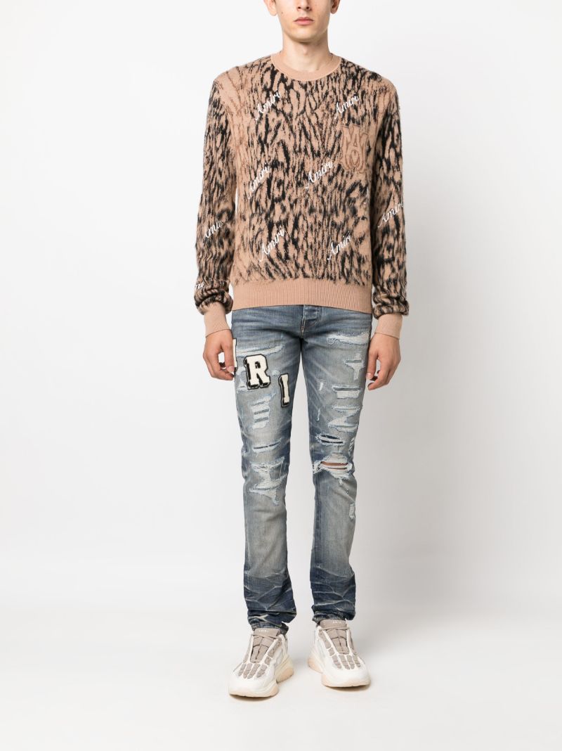 Blue Amiri Varsity Skinny Jeans