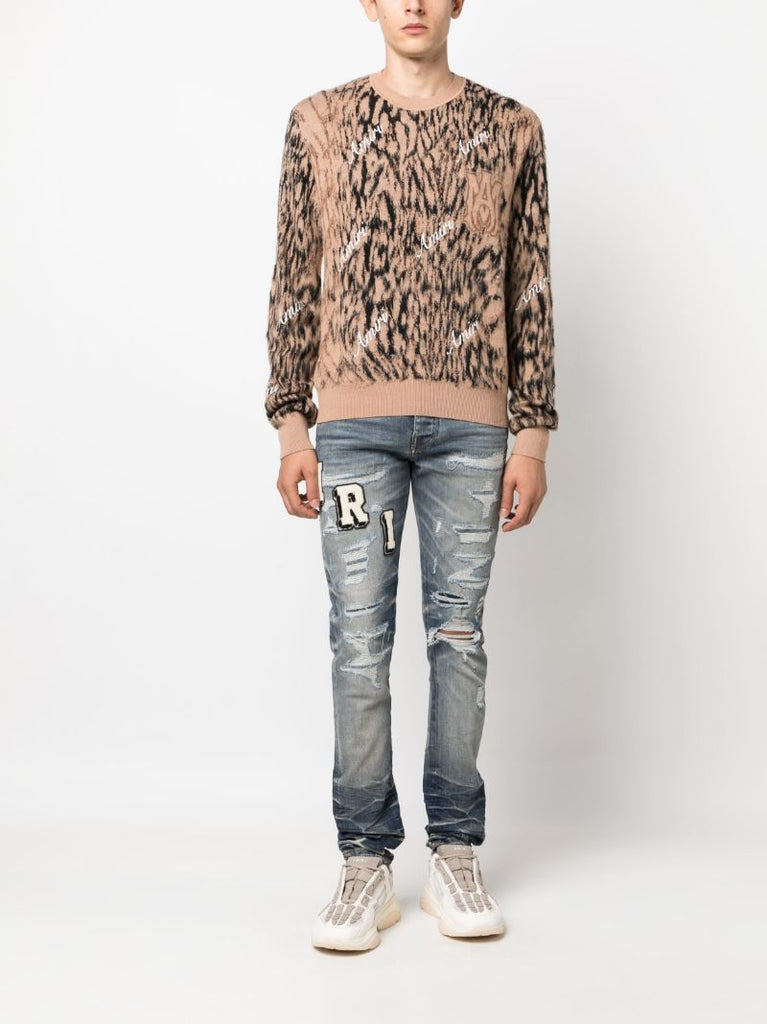 Blue Amiri Varsity Skinny Jeans