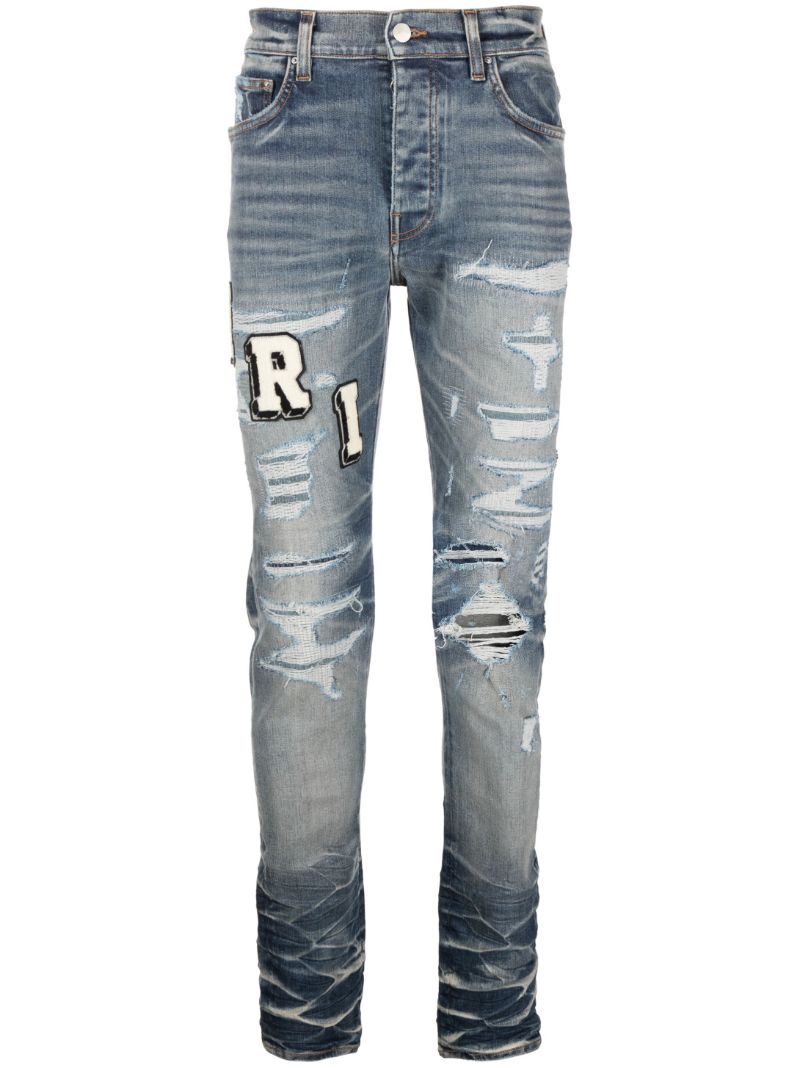 Blue Amiri Varsity Skinny Jeans