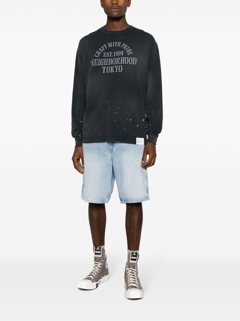 Black Damage Slogan-print T-shirt