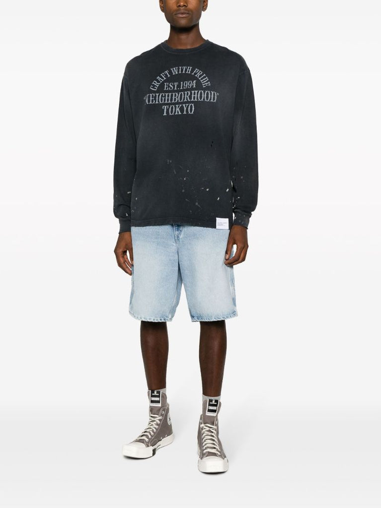 Black Damage Slogan-print T-shirt