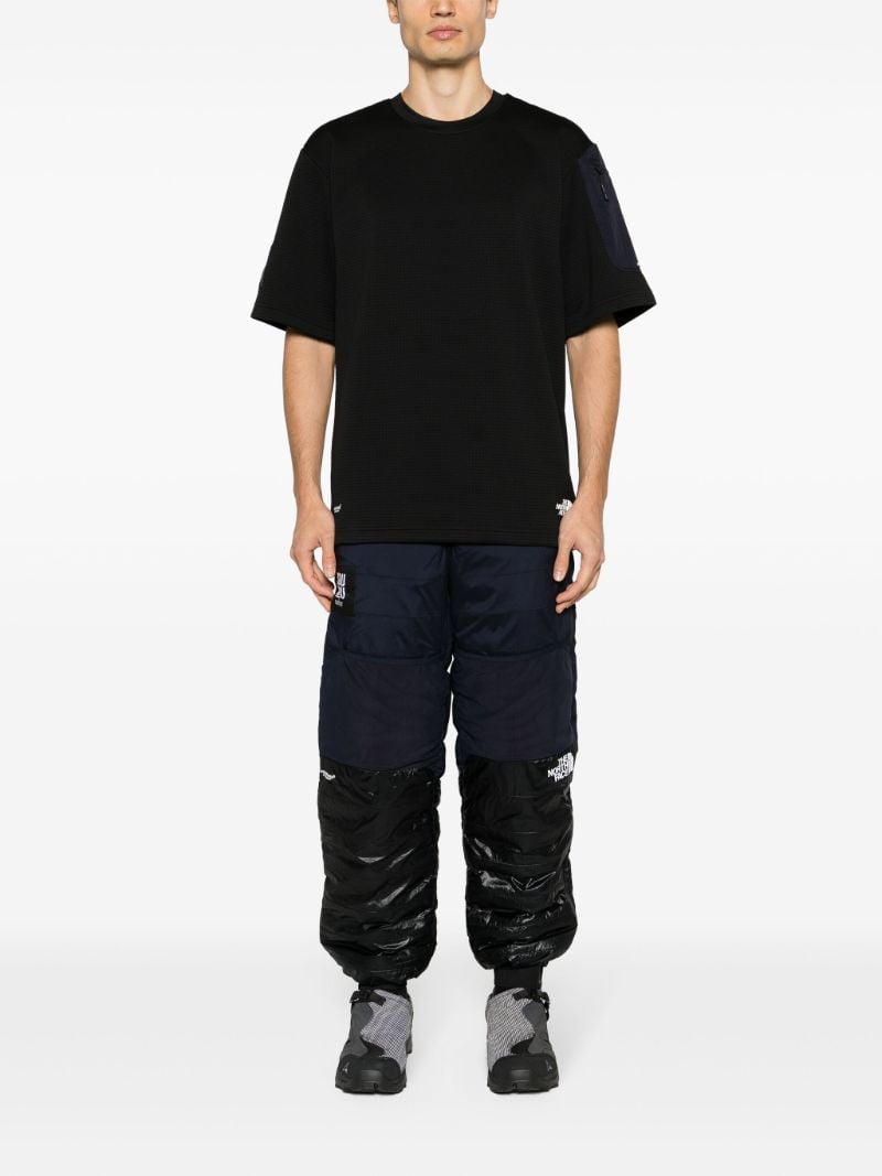 X Undercover Black Soukuu 50/50 Track Pants