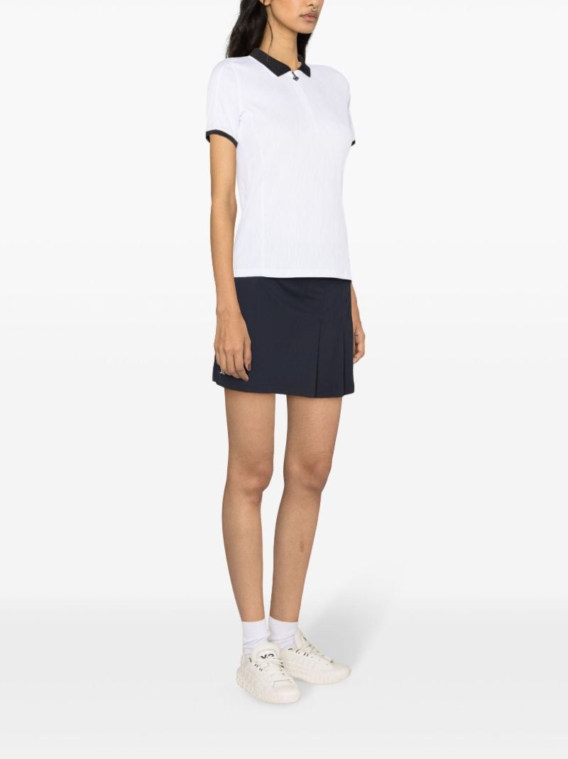 White Izara Performance Polo Shirt