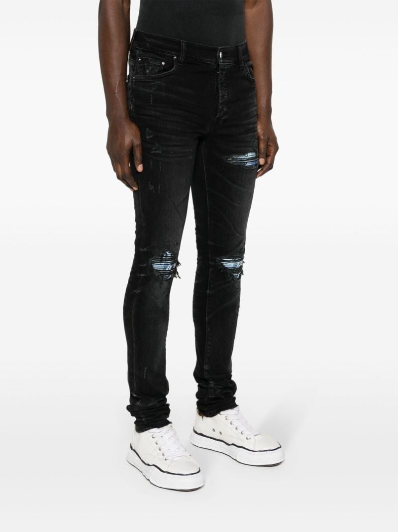 Black Mx1 Distressed Skinny Jeans