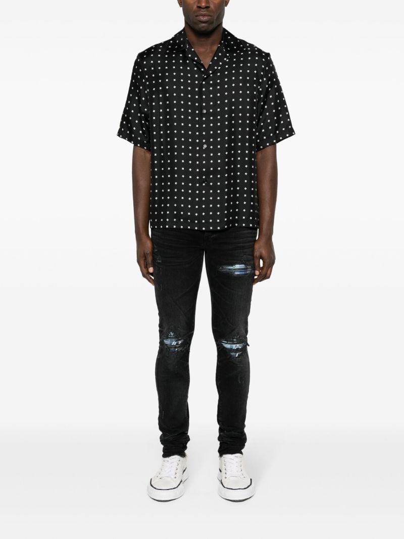 Black Mx1 Distressed Skinny Jeans