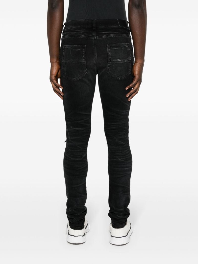 Black Mx1 Distressed Skinny Jeans