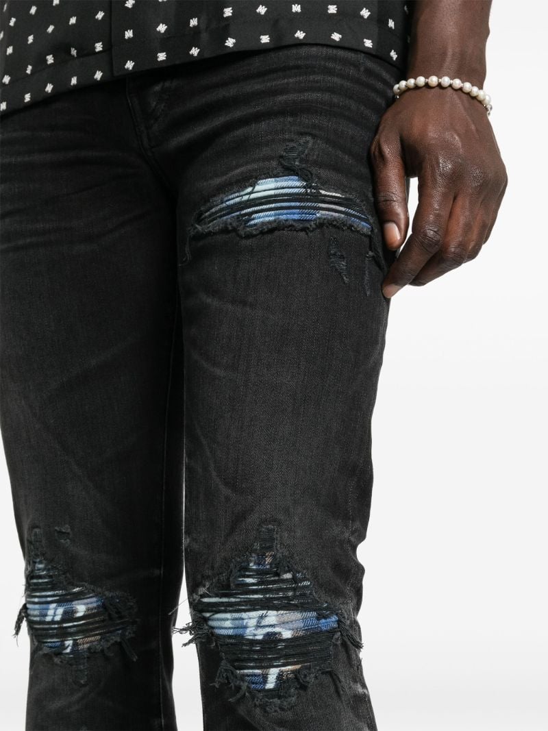 Black Mx1 Distressed Skinny Jeans
