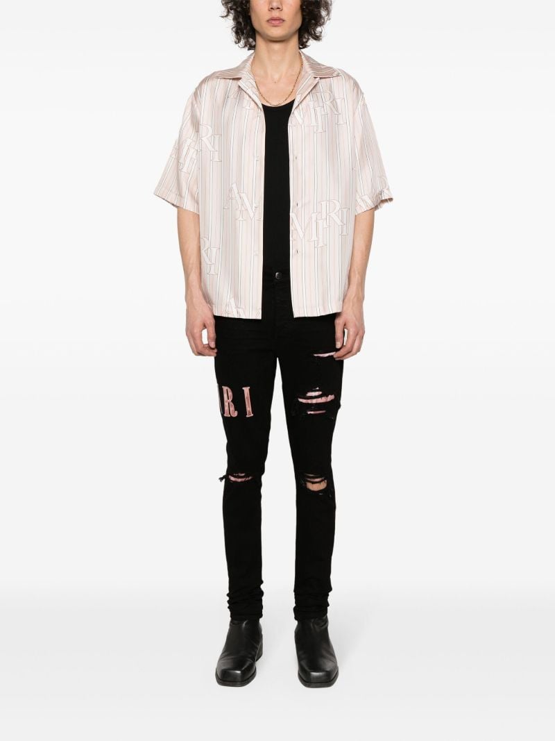 Black Waxed Logo-appliquÃ_x0083_Â© Skinny Jeans
