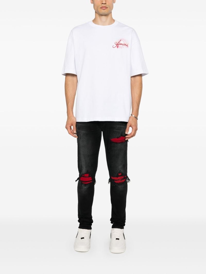 Black Mx1 Suede Skinny Jeans